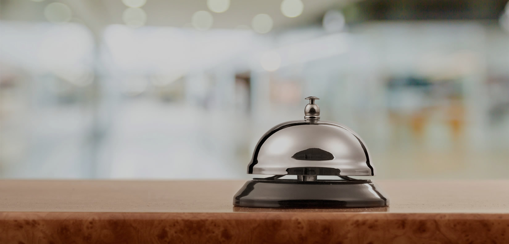 bell at registration counter