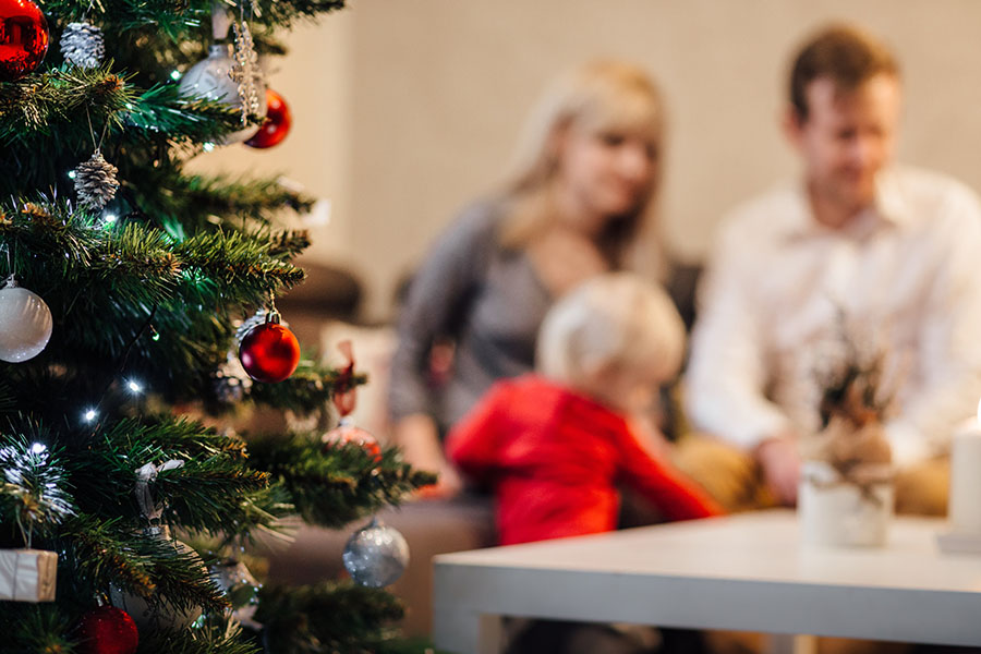 Family by Christmas Tree