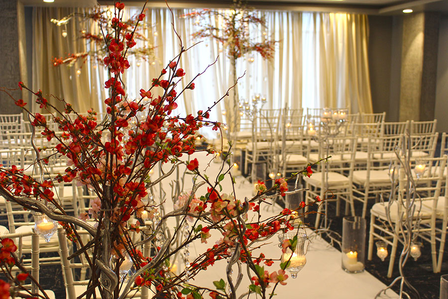 wedding room with red flowers